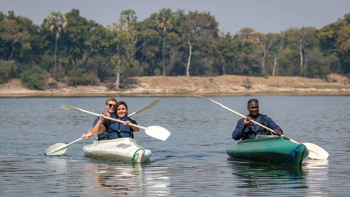 Guests canoeing on the Zambezi River near Livingstone